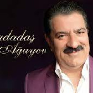 Dodağına gülüş qonub (Sevirem de)